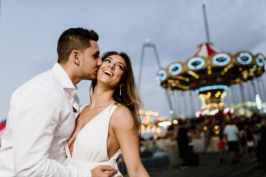 Seaside Heights Boardwalk Summer Ocean County Beach Engagement Session July Love Save the Dates Casino Pier Carnival rides games amusement park ferris wheel 