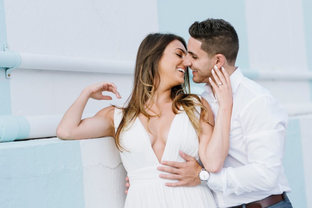 Seaside Heights Boardwalk Summer Ocean County Beach Engagement Session July Love Save the Dates Carnival Games Spin the Wheel Candy Lucky Leo's kiss happy candid