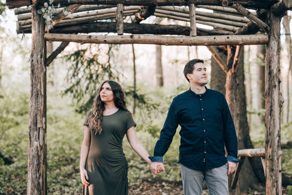 couple wooden pergola forest deserted village of feltville watchung reservation mountainsidenj newprovidencenj autumn fall​engagement session rustic​ ​wedding​