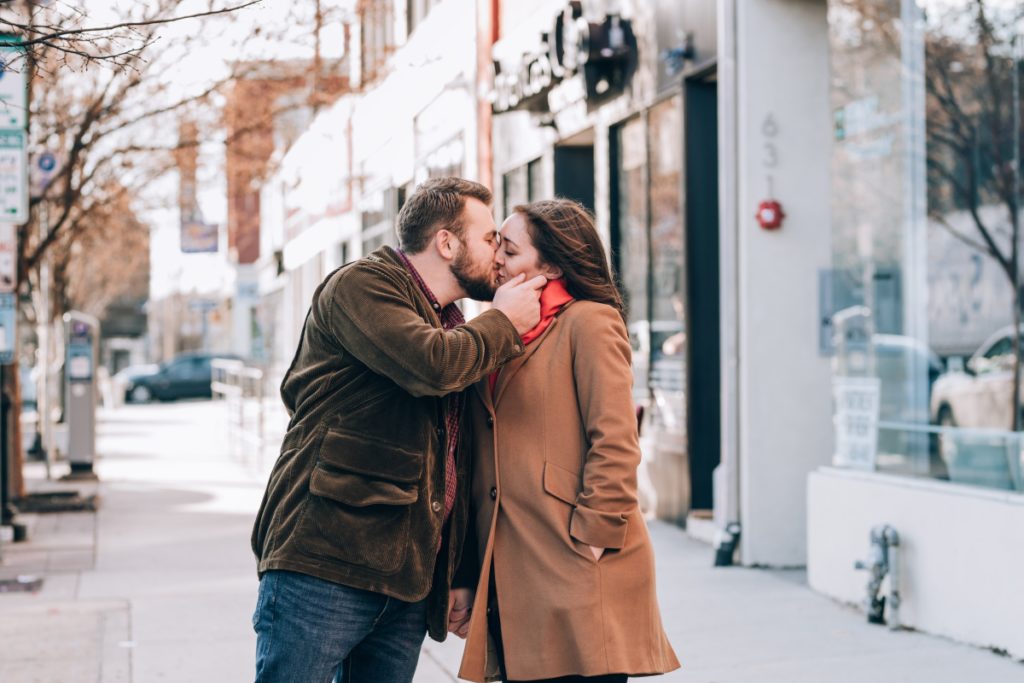 kissing in the street ​Asbury Park Engagement Session Holdfast record shop Asbury Park Boardwalk Winter time​ ​Mogo Korean Fusion Tacos Stone Pony​ ​Asbury Park Convention Hall​ ​engagement session she said yes how they asked wedding east coast photographers love story new jersey montclair bloomfield bloomfield local pinterest vintage the knot nj wedding photographer wedding style love greenweddingshoes junebugweddings 