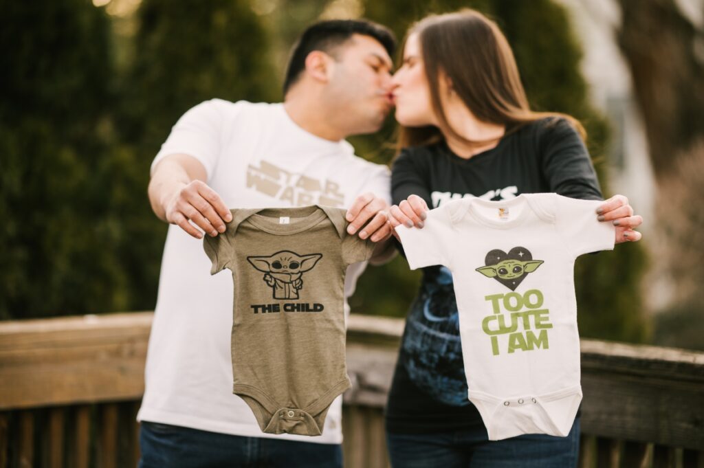 star wars maternity session maywood new jersey mom and dad to be love baby bump expecting parents baby yoda the child mandalorian