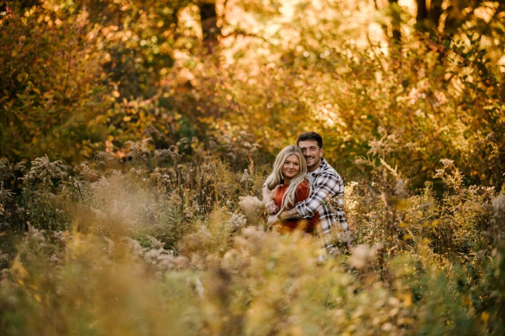 Skylands Manor in Ringwood New Jersey October Engagement Session. Fall session with golden doodle pups. Magical sunset at golden hour.