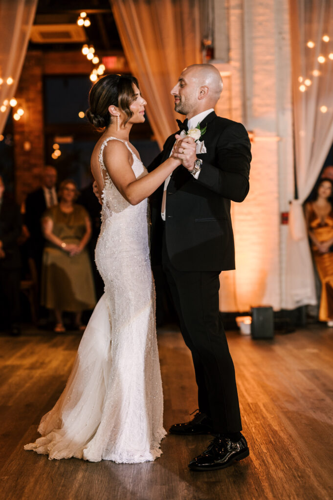 The newly weds enjoying their first dance as husband and wife during their reception at Battello.