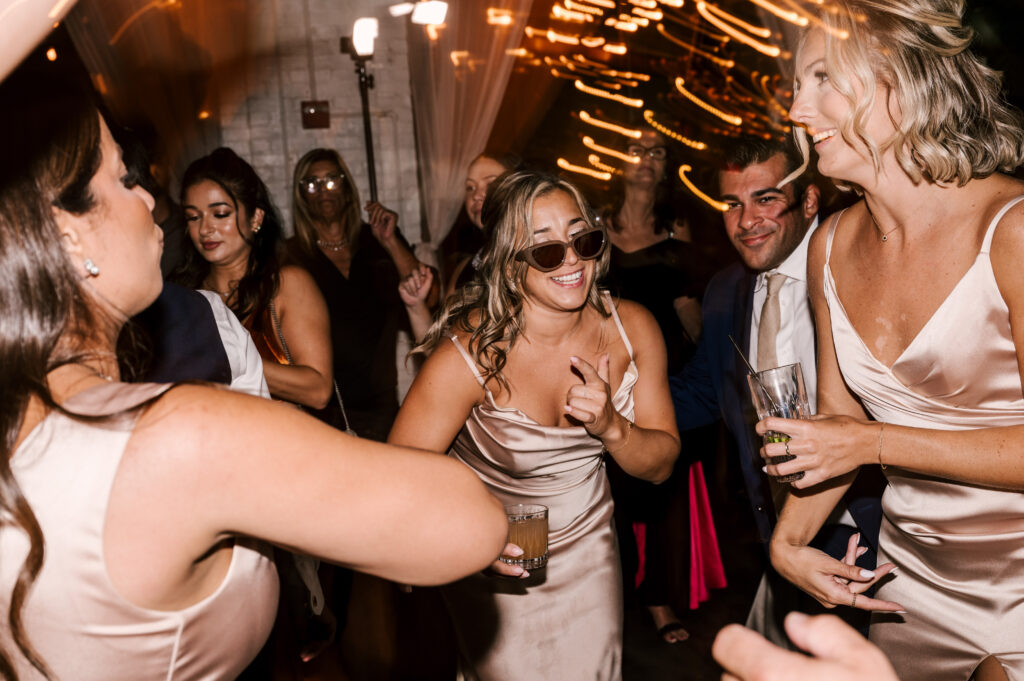 Bridesmaids dancing and enjoying their time at the reception at Battello in Jersey City.