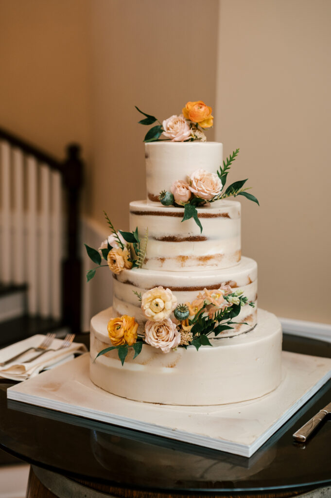 The wedding cake for the reception at Rock Island Lake Club.
