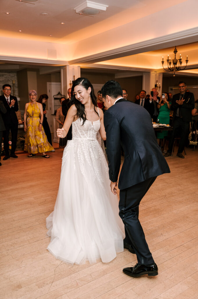 The newlywed's first dance as husband and wife as the reception begins at Rock Island Lake Club.
