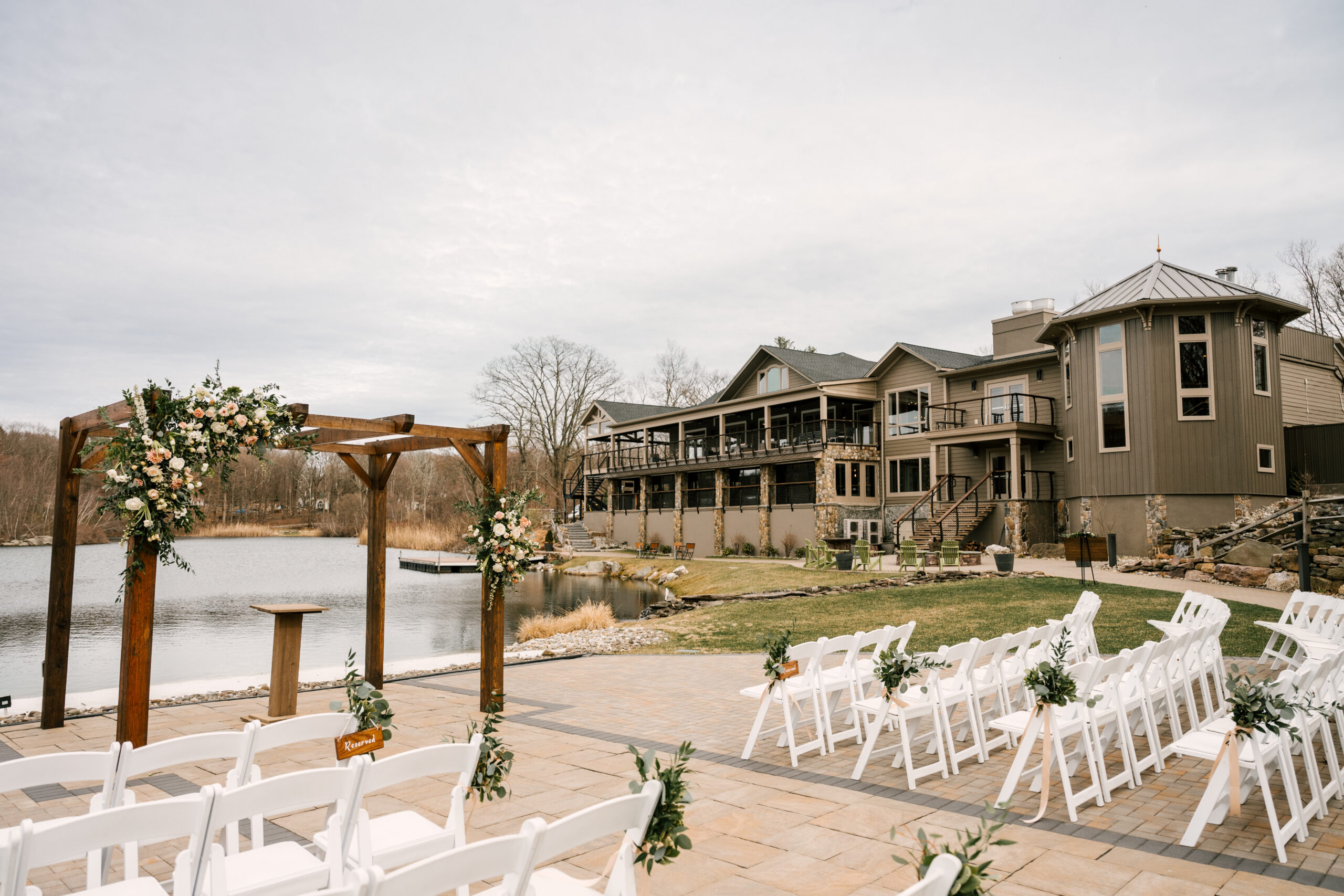 NJ Wedding Venue Rock Island Lake Club set up for ceremony. April wedding by the lake