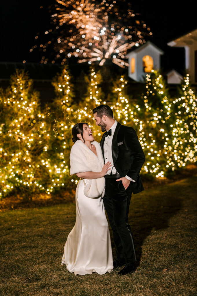 fireworks night shot with Christmas lights. winter wedding at perona farms refinery