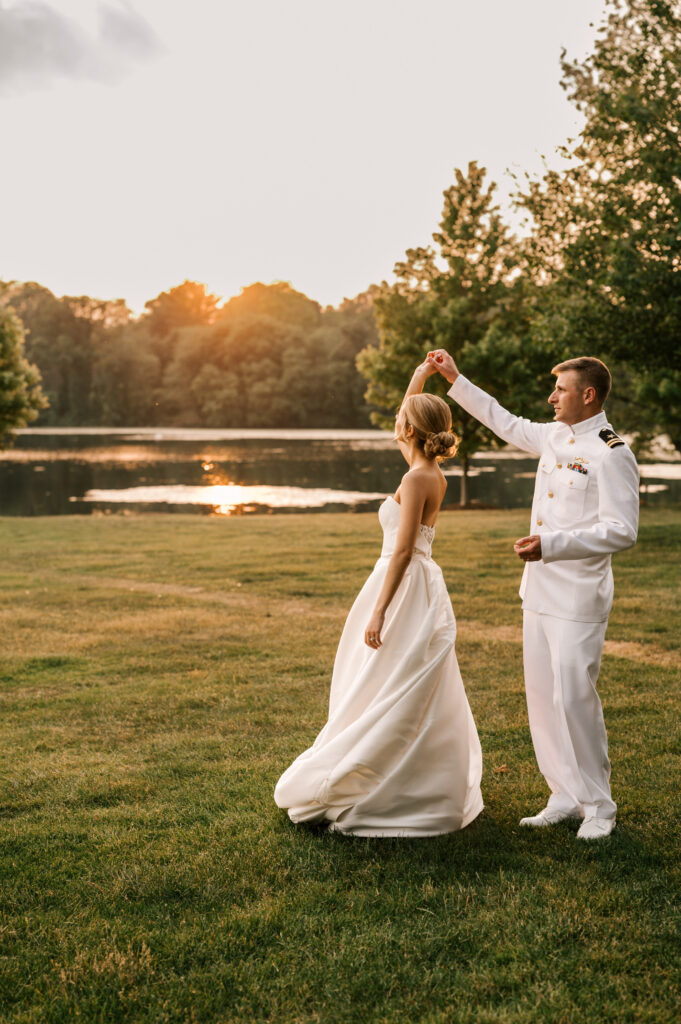 groom twirls and dances with the bride at indian trail club