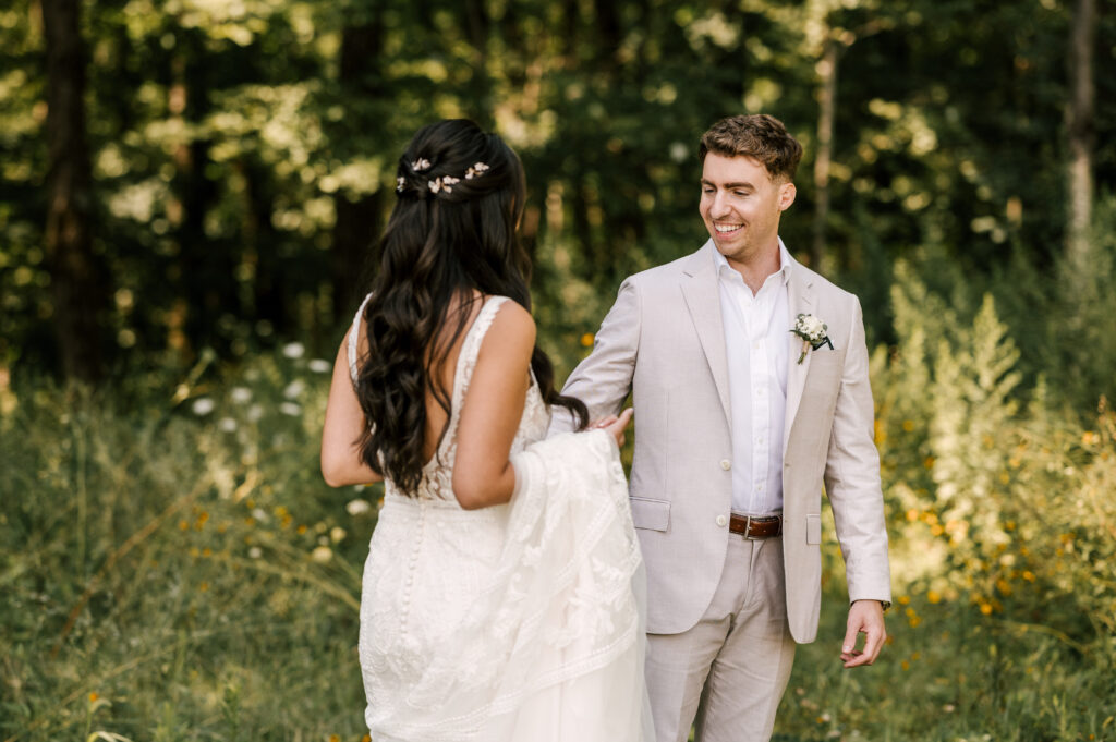 first look bride and groom on dock at Rock Island Lake Club