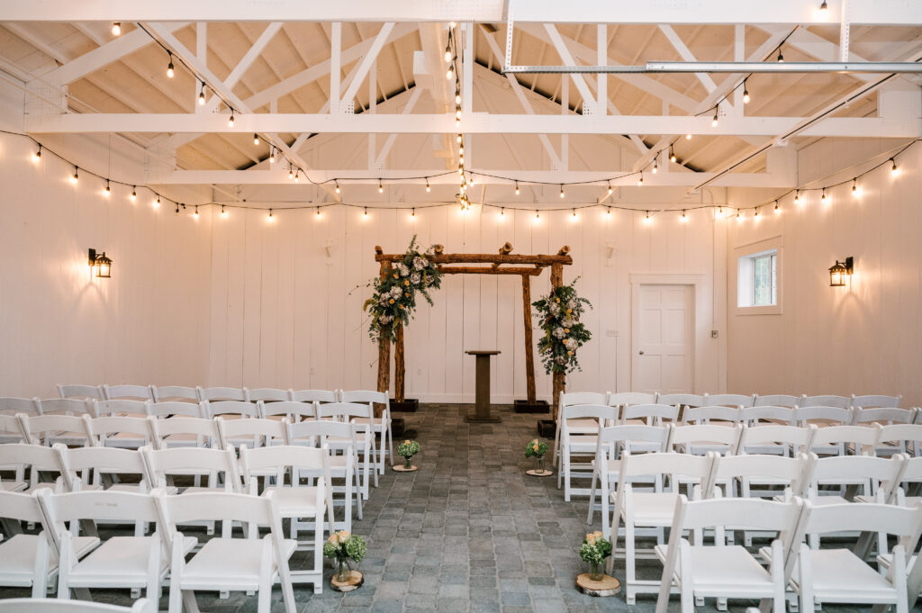 indoor stable ceremony space at bear brook valley wedding venue