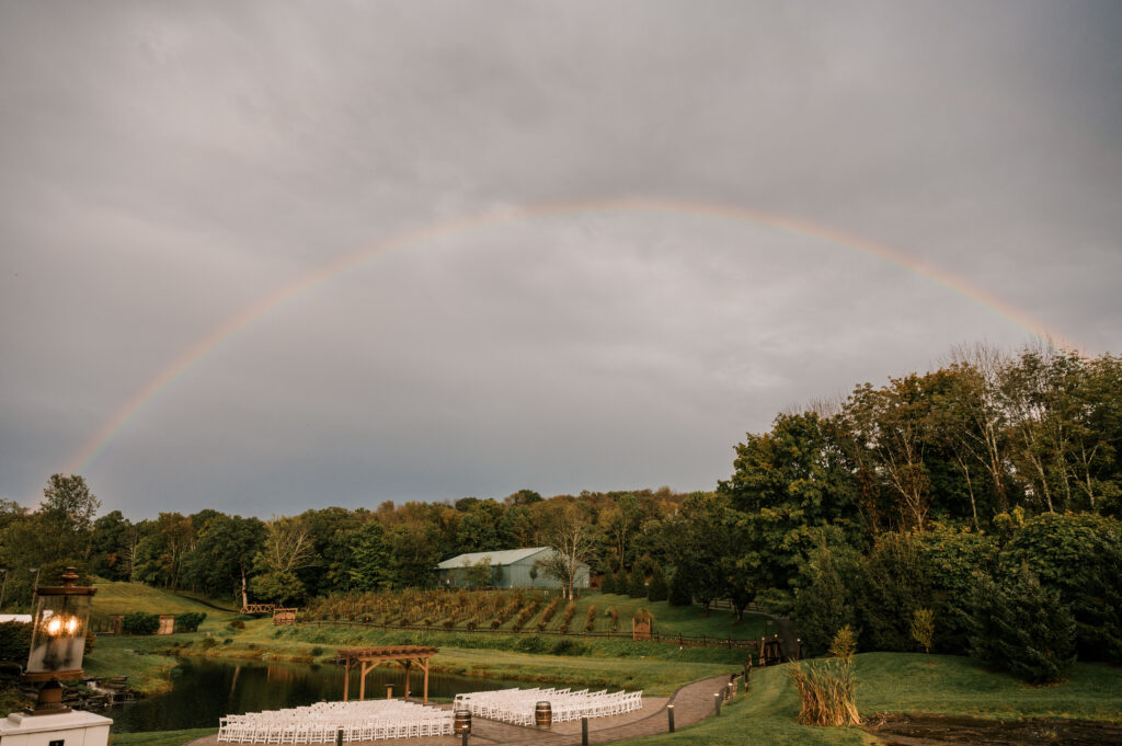sunset at Bear Brook Valley wedding venue in fredon township nj with rainbow
