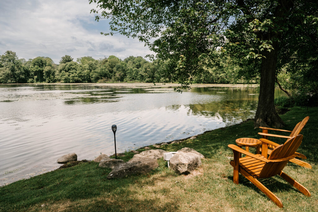 Lakeside views and Adirondack chairs at Indian Trail Club in Franklin Lakes New Jersey