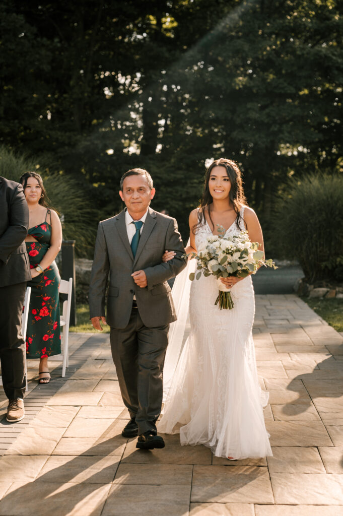 father of bride walking daughter down aisle during rock island lake club nj wedding