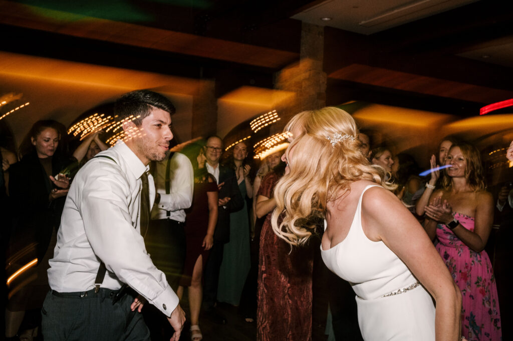 bride and groom dancing with guests at their perona farms nj wedding