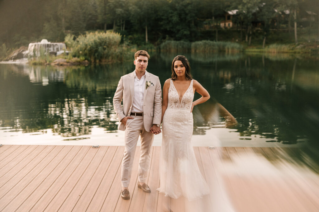 film style photo on the lake at rock island lake club with bride and groom in nj 