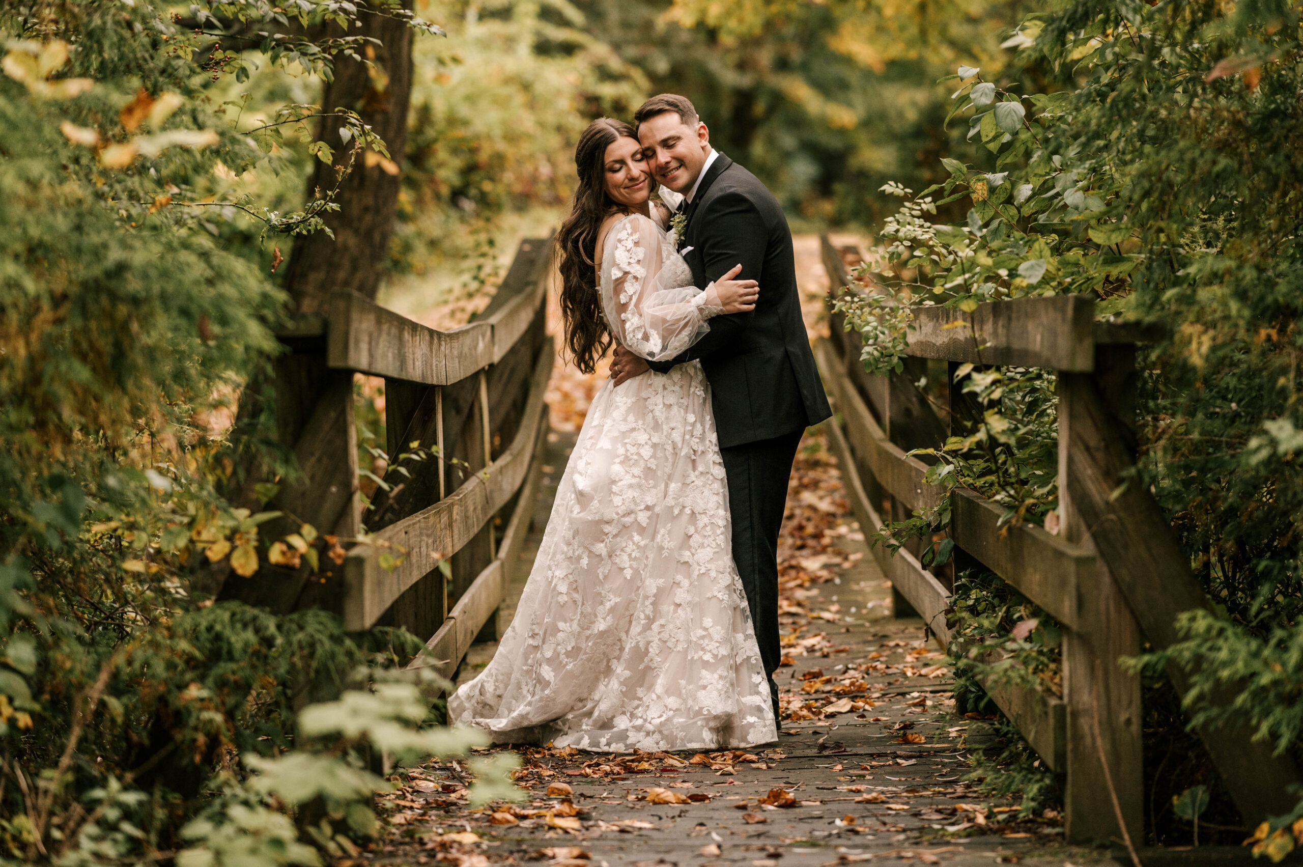 bride and groom on wooden bridge at waterloo village nj wedding venue